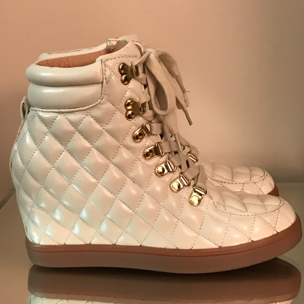 Cream color quilted faux leather wedge sneakers